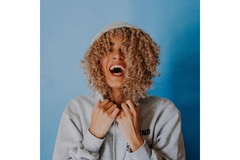 Image Woman happy with curly hair
